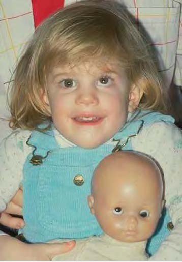 Mädchen und ihre Puppe