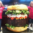 two girls with a 338 lb burger